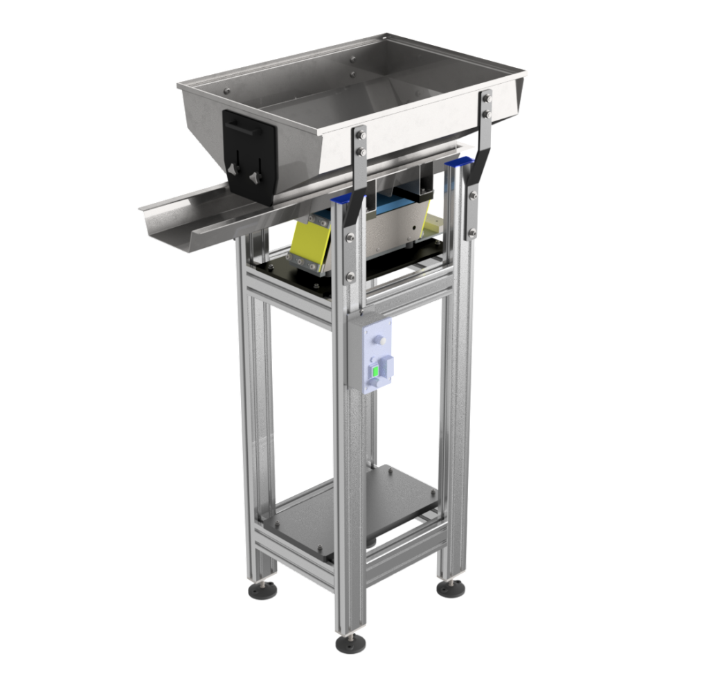 A small tall hopper with a chute at the bottom, there is a small vibrator unit under neath, controller on side