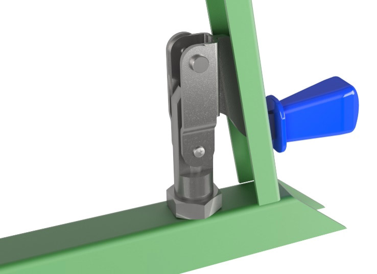A close up of a toggle clamp in a green metal with a grip in blue. This is a nose mounted clamp product.